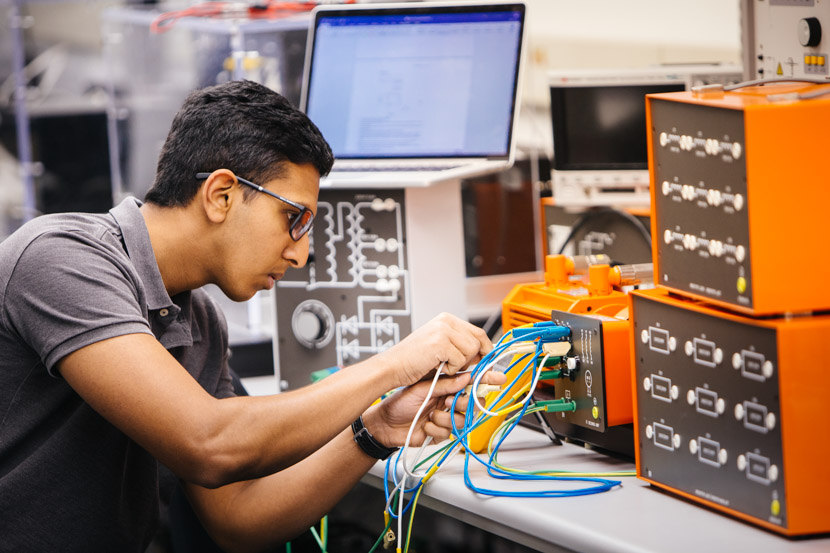 Photo of student at work in the Granger electrical engineering lab