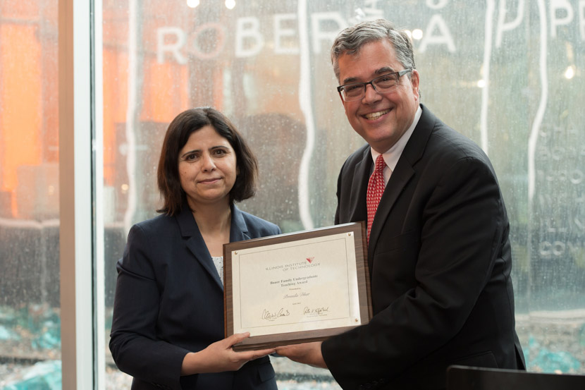 Photo of Promila Dhar receiving teaching award