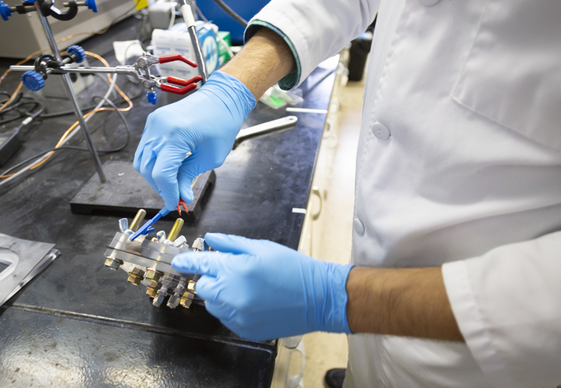 A research student builds a solar fuel cell at Armour
