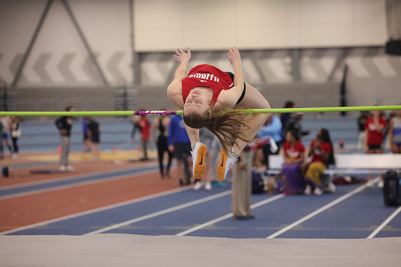 Illinois Tech student-athlete Olivia Jameson (ARCH 3rd Year) competes in the high jump