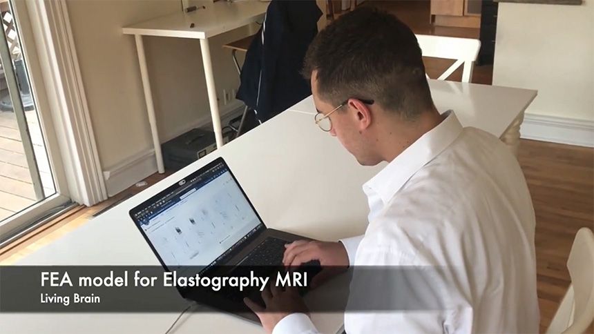 idmet FEA model for Elastography MRI - student looking at computer