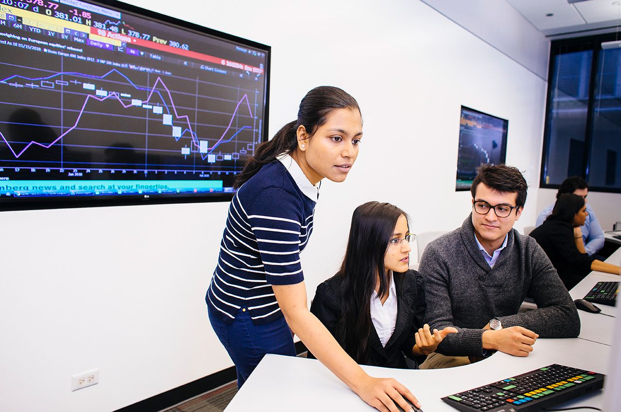 Stuart School of Business students work in the Bloomberg Lab