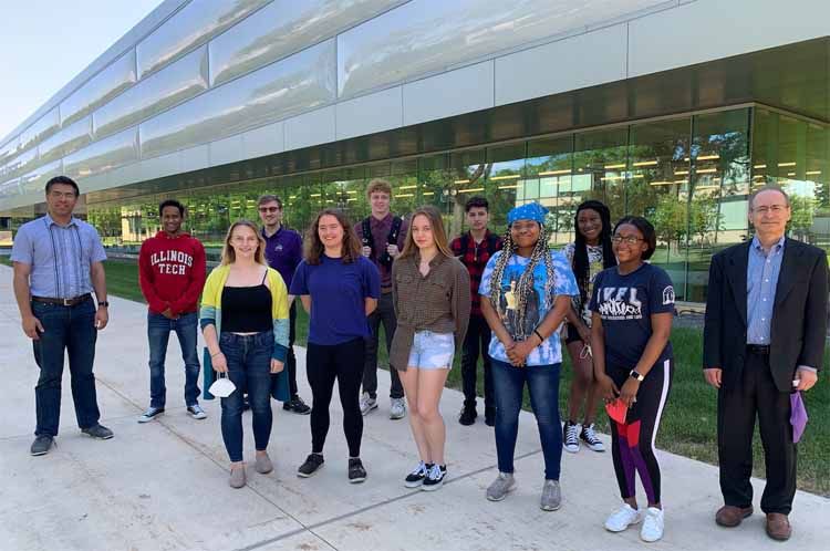 Group of REU students outdoors