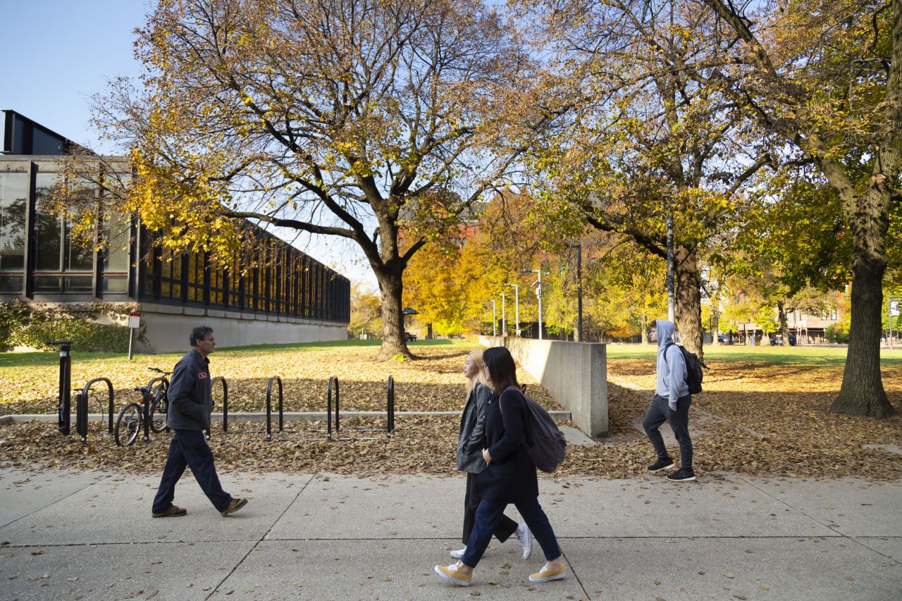 Illinois Tech students walk on campus near Paul V. Galvin Library