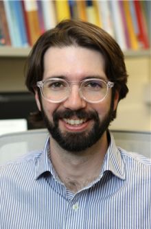 Headshot of Andres Goza, assistant professor at UIUC.