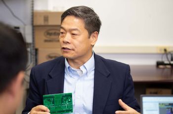 A photo of Grainger Professor of Electrical and Computer Engineering John Shen in the lab