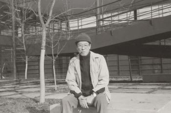 Arthur Takeuchi sitting