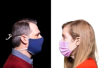 Arlen Molle and Nicole Legate, wearing masks, looking as if they're staring at each other