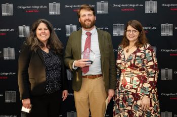 Michelle Vodenik, Jacob Marshall '24, and Carolyn Shapiro pose together at the 2024 Public Interest Awards with Marshall's Vivien C. Gross Pro Bono and Public Interest Leadership Award