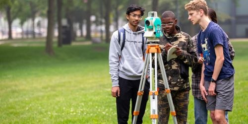 Students work together during Elevate College Prep's surveying summer program in summer 2023