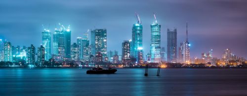 Mumbai at night with sea in foreground