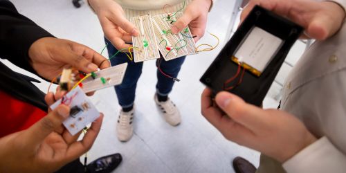 Illinois Tech students work on computer hardware
