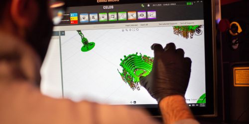 An Illinois Tech student works on a DMG Mori machine