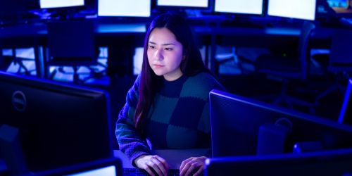 Illinois Tech alumna Anthea Gonzalez works in a campus computer lab