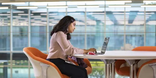 An Illinois Tech student works at Kaplan Institute