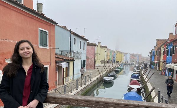 Kaitlyn Graves (EE/M.S. EE 4th Year) on a balcony outside one of the canals of Venice, Italy