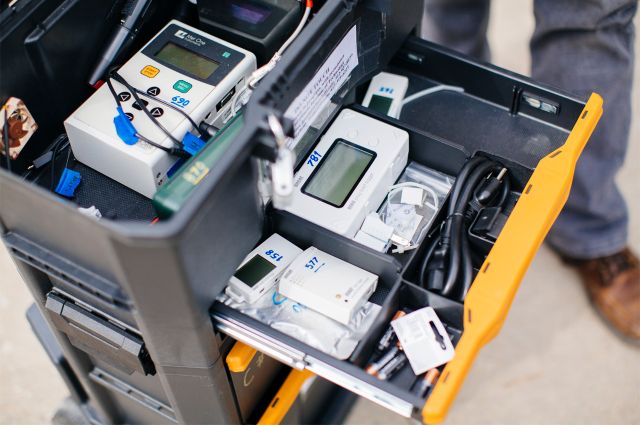 Suite of monitoring instruments used by researchers to track indoor and outdoor air quality and ventilation system operation