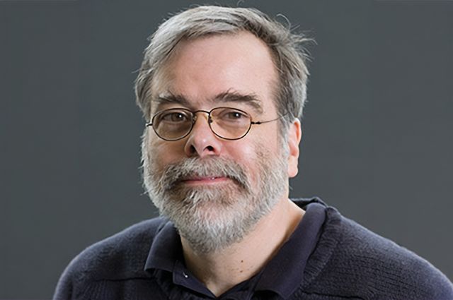 Headshot of Professor of Physics Grant Bunker