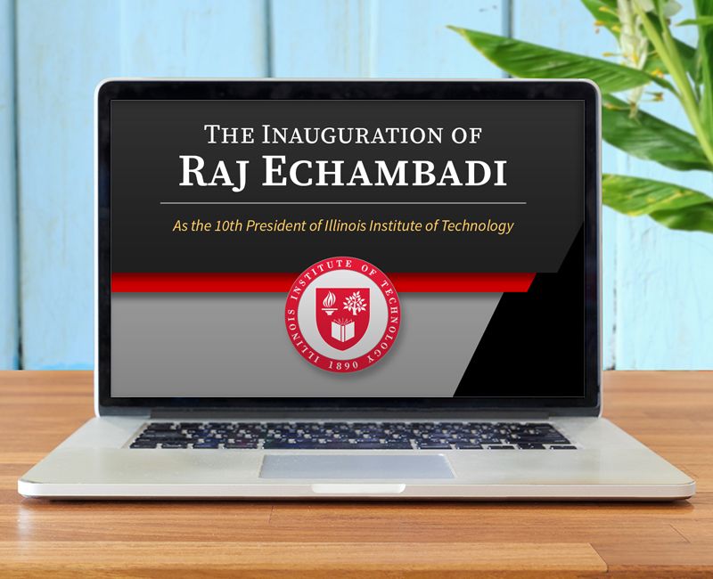 laptop computer with Raj Echambadi Inauguration livestream info on the screen
